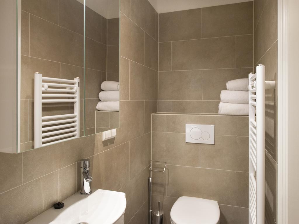 Bizstay Park Central Apartments L'Aia Esterno foto